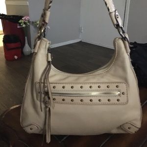 Beige color Micheal Kors purse